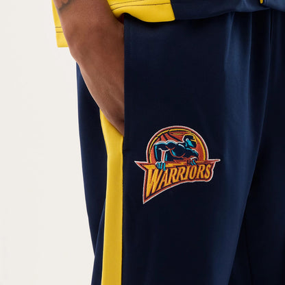 The model is wearing this NBA Hardwood Classic Straight Golden State Warriors Straight Leg Joggers in dark blue. 3