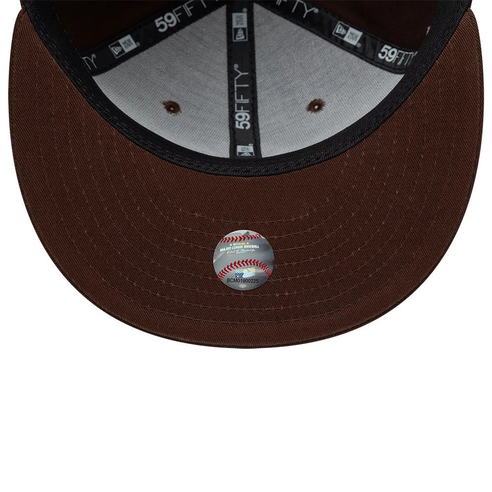 Pictured is this MLB Floral New York Yankees 59FIFTY Fitted cap in dark brown. 7