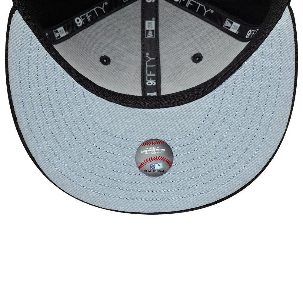 Chicago White Sox MLB Floral Black New Era 9FIFTY Snapback Adjustable Cap, inside view showing light blue undervisor with contrasting black stitching, black taping with white logos, and an interior size sticker on the centre of the visor.