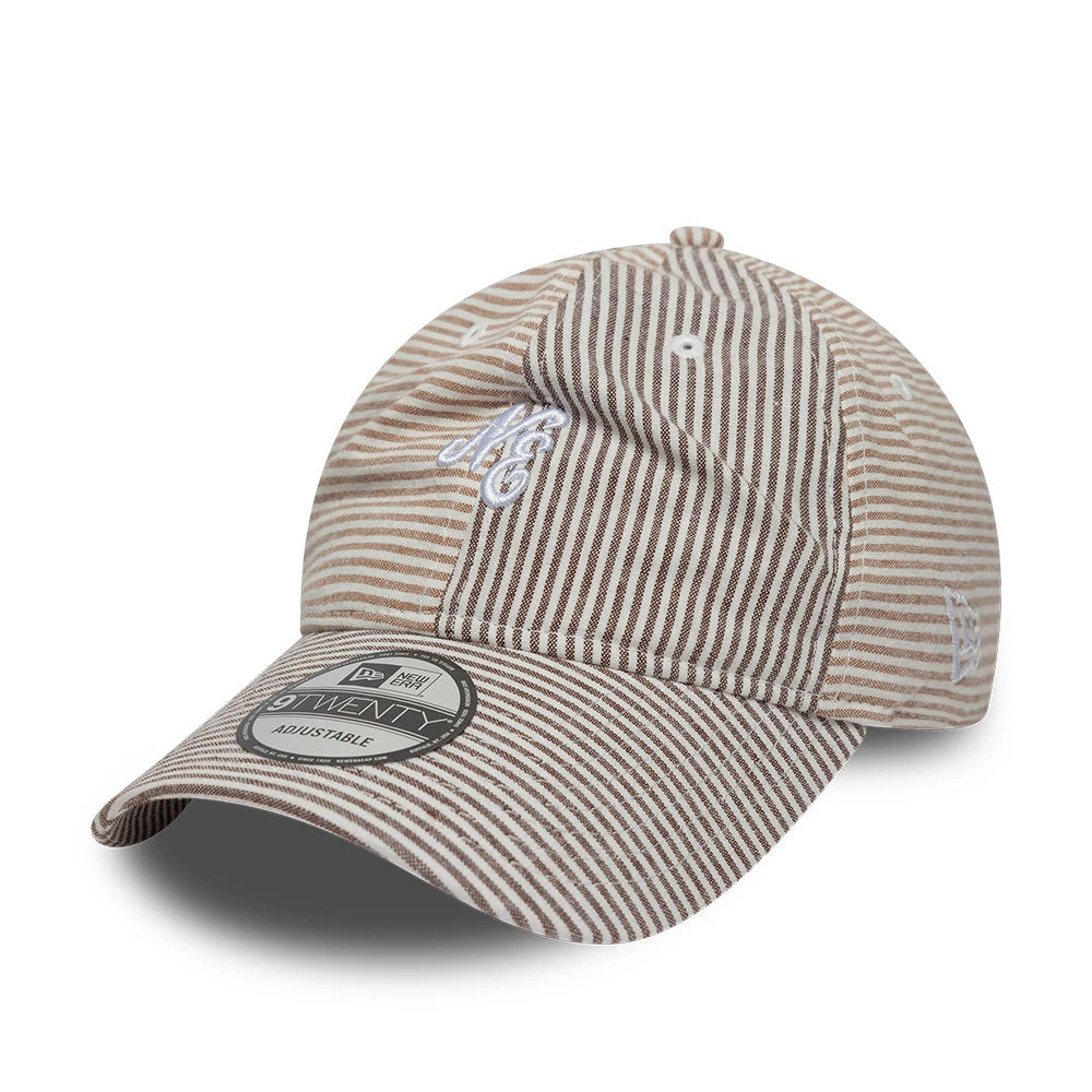 Pictured is this New Era Stripe Brand New Era 9TWENTY cap in beige and brown. 1