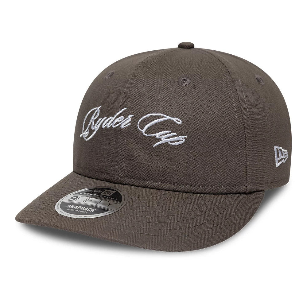 Pictured is this Ryder Cup 2027 Herringbone Retro Crown 9FIFTY cap in grey. 1