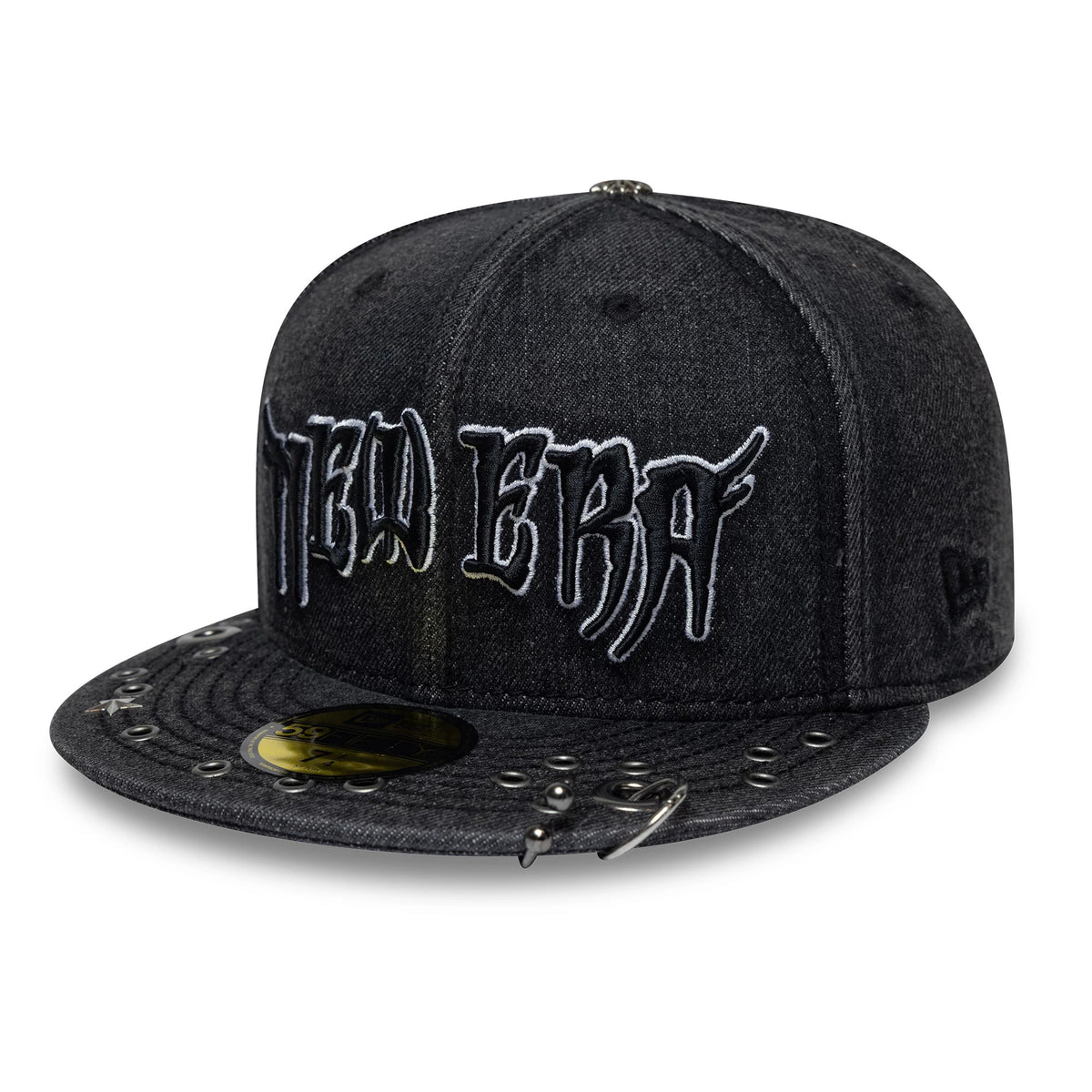 New Era Hardware Washed Black New Era 59FIFTY Fitted Cap, three-quarter view showing white embroidered New Era lettering across the front panels, black flat visor adorned with eyelets, and gold 59FIFTY size sticker.