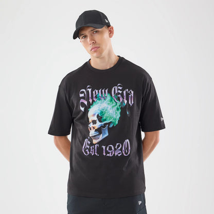 The model is wearing this New Era Skull Graphic Oversized T-Shirt in black. 1