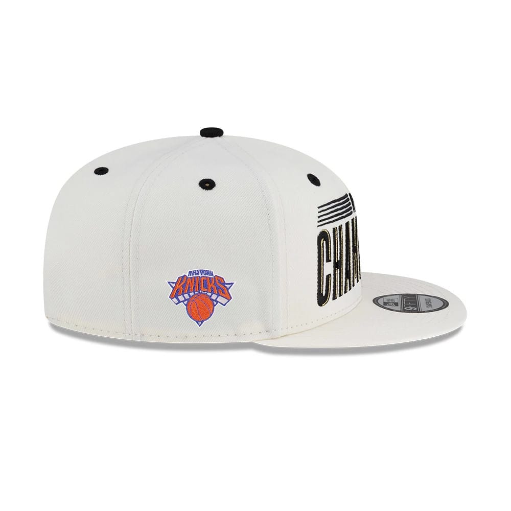 Pictured is this NBA Finals Parade 2026 New York Knicks 9FIFTY Snapback cap in white. 5