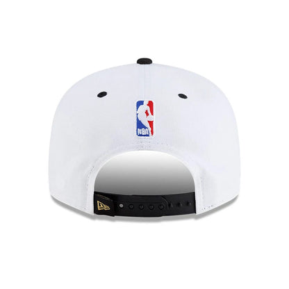Pictured is this NBA Finals Champions 2026 New York Knicks 9FIFTY Snapback cap in white. 6