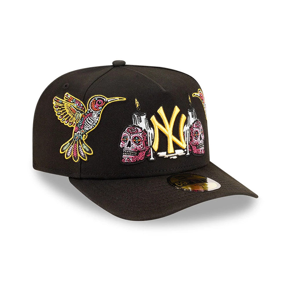 Yankees MLB Day Of The Dead Black New Era 59FIFTY A-Frame Fitted Cap, front view showing a yellow NY logo embroidered on the front panel, surrounded by colourful skulls and candles, with a 59FIFTY size sticker on the black visor.
