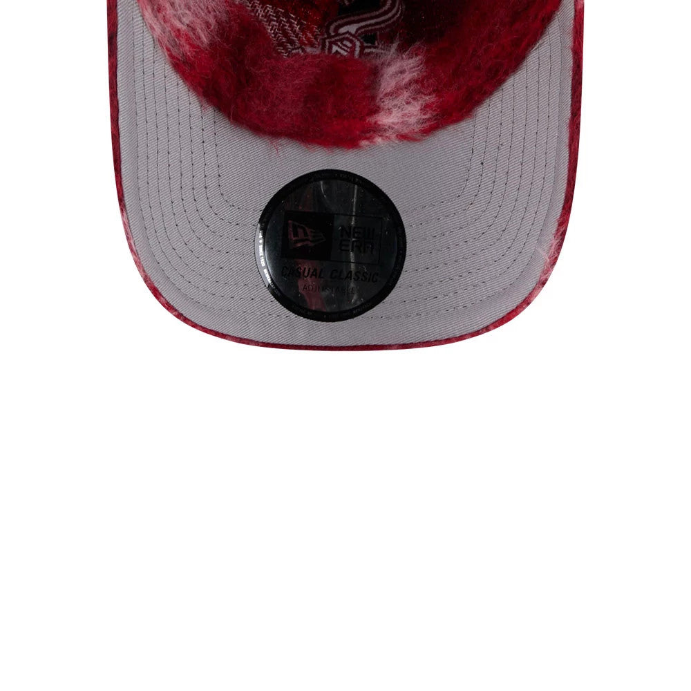 New Era Chicago White Sox MLB Fabric Story Red Casual Classic Adjustable Cap, underside view showing a grey undervisor with stitched panel lines, a black New Era Casual Classic adjustable sticker, and a fuzzy red edge around the visor.