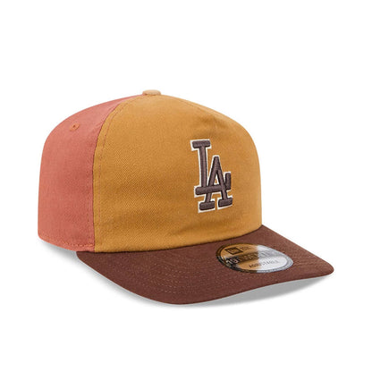 LA Dodgers MLB Fall Story Multi New Era 19TWENTY Adjustable Cap, three-quarter view showing the front LA logo embroidered in brown on a mustard front panel, with a contrast brown visor and a 19TWENTY size sticker.