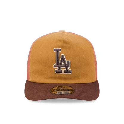 LA Dodgers MLB Fall Story Multi New Era 19TWENTY Adjustable Cap, front view showing the white and brown embroidered LA logo on the brown crown, with a contrasting brown visor and a 19TWENTY size sticker on the underside.
