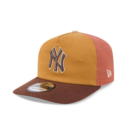 New York Yankees MLB Fall Story Multi New Era 19TWENTY Adjustable Cap, three-quarter view showing the raised brown NY logo embroidered on the mustard front panel, brown flat visor with 19TWENTY size sticker.