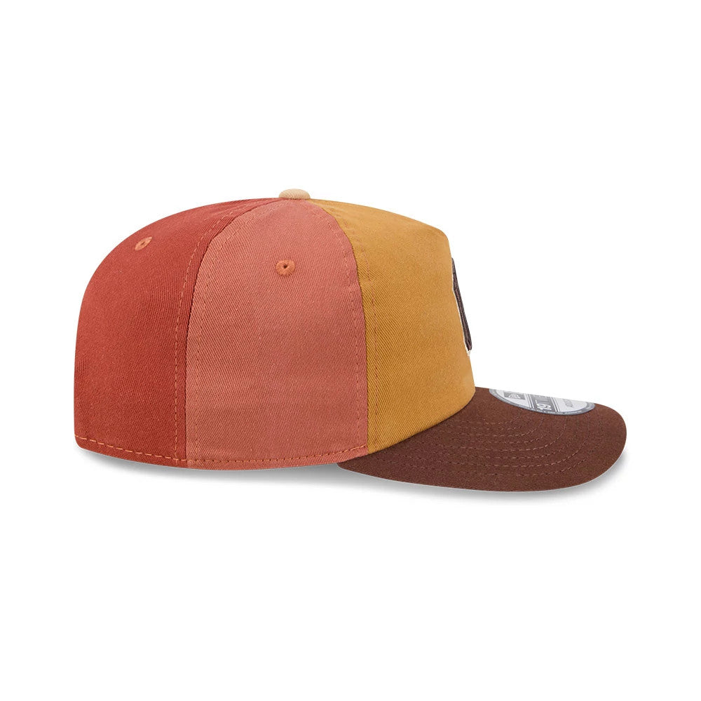 New York Yankees MLB Fall Story Multi New Era 19TWENTY Adjustable Cap, side view showing a multi-coloured panel design with shades of orange, mustard and brown, featuring a brown flat visor and matching eyelets on the structured crown.