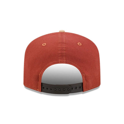 Atlanta Braves MLB Fall Story Multi New Era 19TWENTY Adjustable Cap, rear view showing the dark brown adjustable strap and sewn eyelets on a rich rust-coloured crown, with a vintage look and no logo at the back.