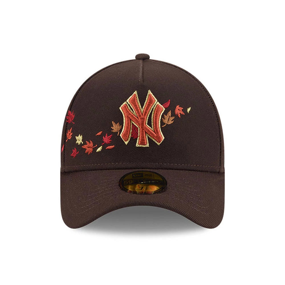 Yankees MLB Fall Story Dark Brown New Era 59FORTY A-Frame Fitted Cap, front view showing orange and red embroidered Yankees logo and autumn leaves pattern on the front panel, with a classic curved visor and a gold 59FORTY size sticker.