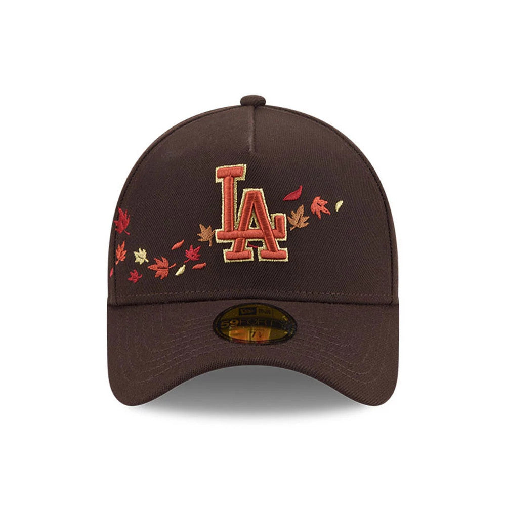 LA Dodgers MLB Fall Story Dark Brown New Era 59FORTY A-Frame Fitted Cap, front view showing the raised LA logo embroidered in autumn hues on the brown crown, with scattered leaf embroidery and a gold 59FORTY size sticker on the curved visor.