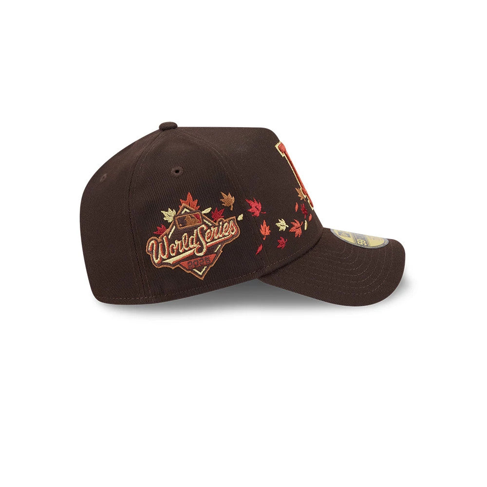 LA Dodgers MLB Fall Story Dark Brown New Era 59FORTY A-Frame Fitted Cap, side view showing an embroidered World Series 1988 logo with autumn leaves on the side panel, a structured dark brown crown, and a gold 59FORTY size sticker on the visor.