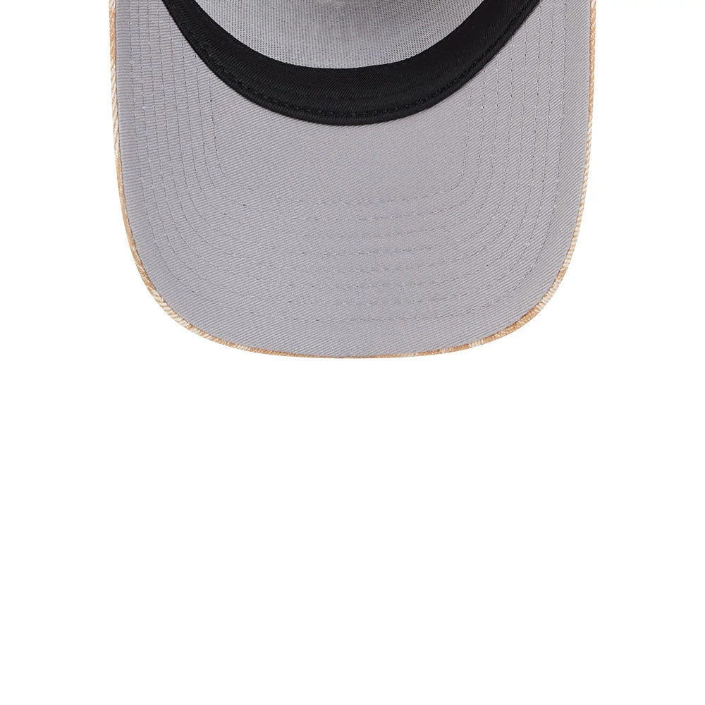 New York Knicks NBA Fall Story Beige New Era 9FORTY A-Frame Adjustable Cap, inside view showing the light grey undervisor, black sweatband around the inner edge, and detailed stitching on the visor.