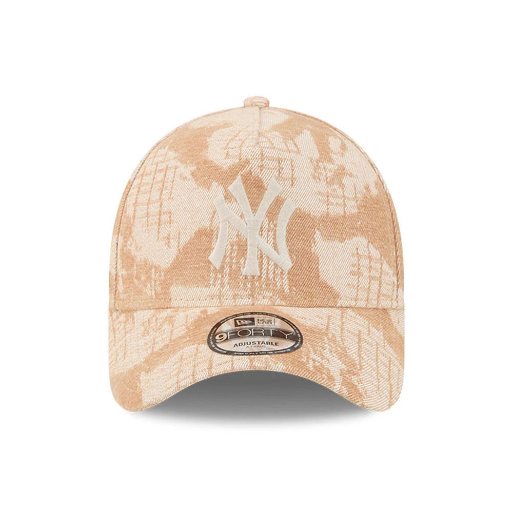 New York Yankees MLB Fall Story Dark Beige New Era 9FORTY A-Frame Adjustable Cap, front view showing a raised white embroidered NY logo on the structured crown, a pattern of leaves and trees, and a 9FORTY size sticker on the curved visor.