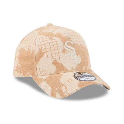 Chicago White Sox MLB Fall Story Beige New Era 9FORTY A-Frame Adjustable Cap, three-quarter view showing the white embroidered team logo on the beige camo-patterned front panel, curved visor, and 9FORTY size sticker.