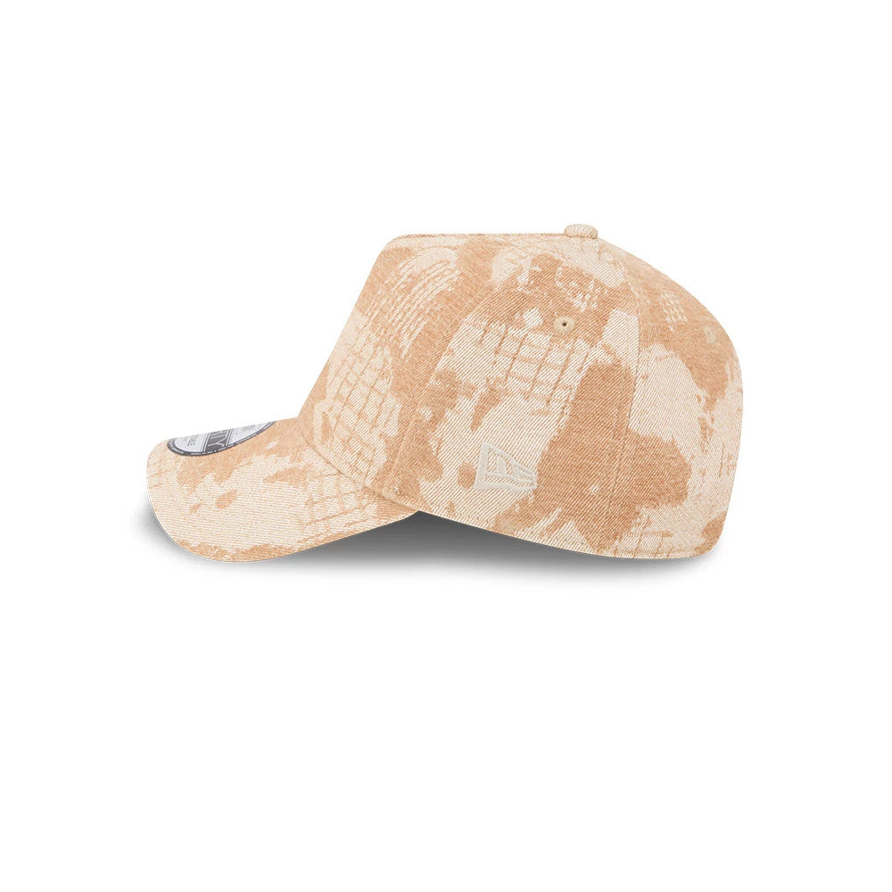 LA Dodgers MLB Fall Story Beige New Era 9FORTY A-Frame Adjustable Cap, side view showing the textured beige pattern on the structured crown and curved visor, with the New Era flag logo on the left side and an eyelet near the top.