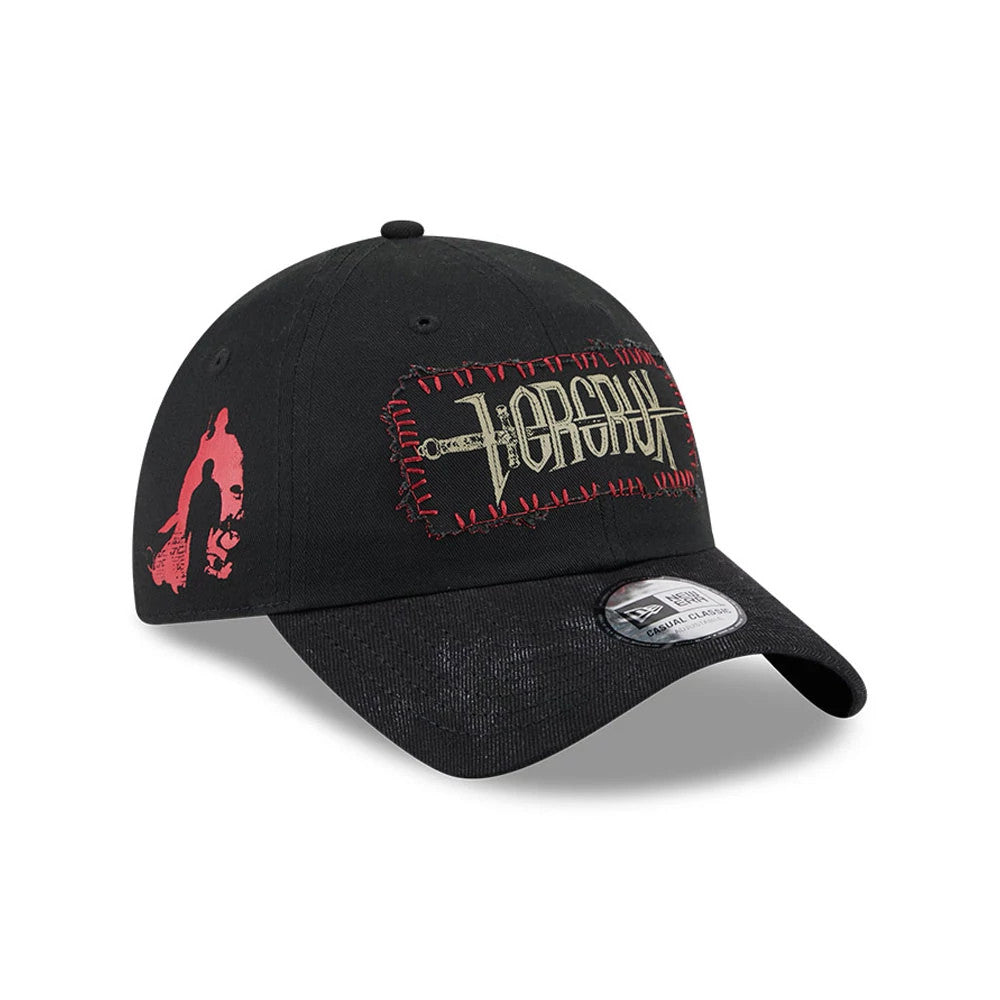 Harry Potter Horcrux Black New Era Casual Classic Adjustable Cap, three-quarter view showing a sword graphic on the front panel with Horcrux lettering, a distinct red design featuring a figure on the left side.