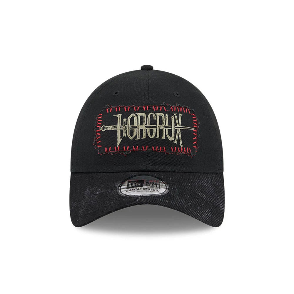 Harry Potter Horcrux Black New Era Casual Classic Adjustable Cap, front view showing gold and red embroidered Horcrux graphic with dagger detail on the black crown, black curved visor with a Casual Classic size sticker in grey and white.