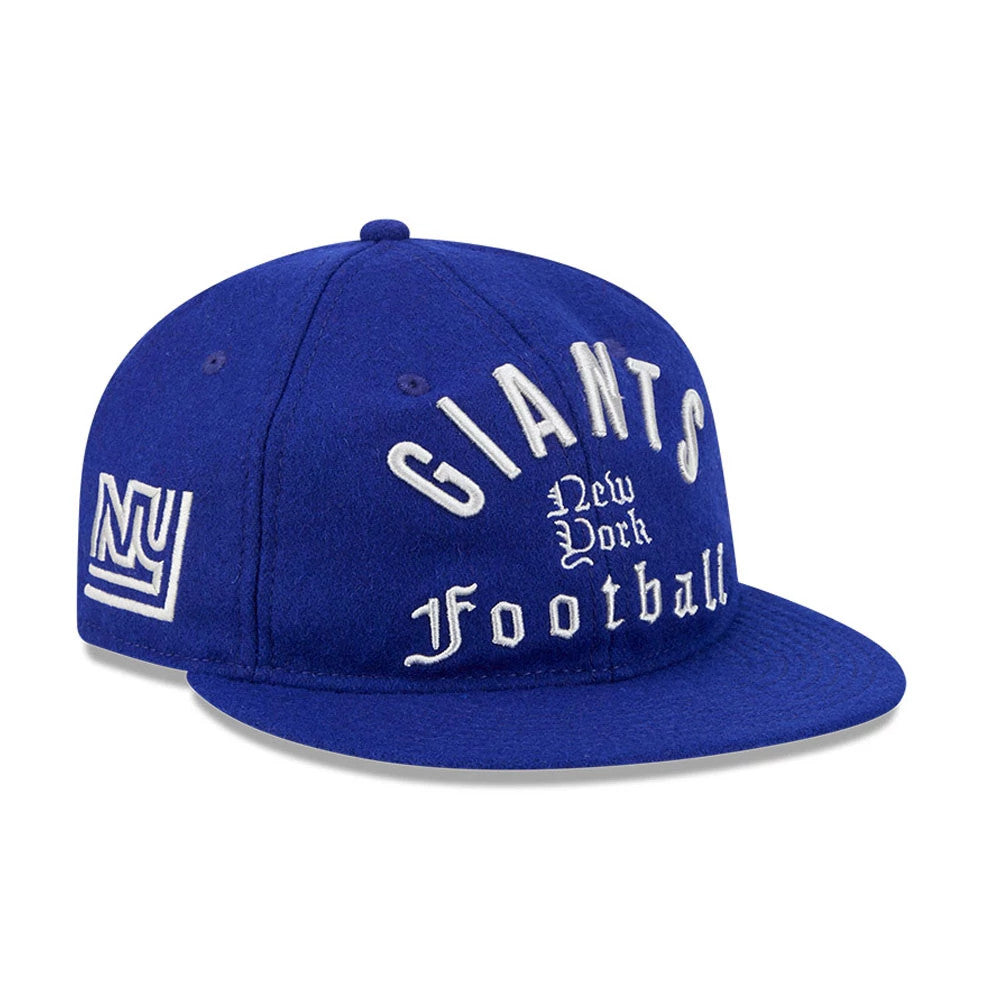 Giants NFL Historic Arch Dark Blue Retro Crown New Era 59FIFTY Fitted Cap, three-quarter view showing raised white embroidered Giants and Football text on the front panel, flat dark blue visor, and white New York logo on the left side.