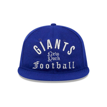 Giants NFL Historic Arch Dark Blue New Era Retro Crown 59FIFTY Fitted Cap, front view showing raised white embroidered Giants New York Football lettering prominently on the structured dark blue crown, with a top button and eyelets.
