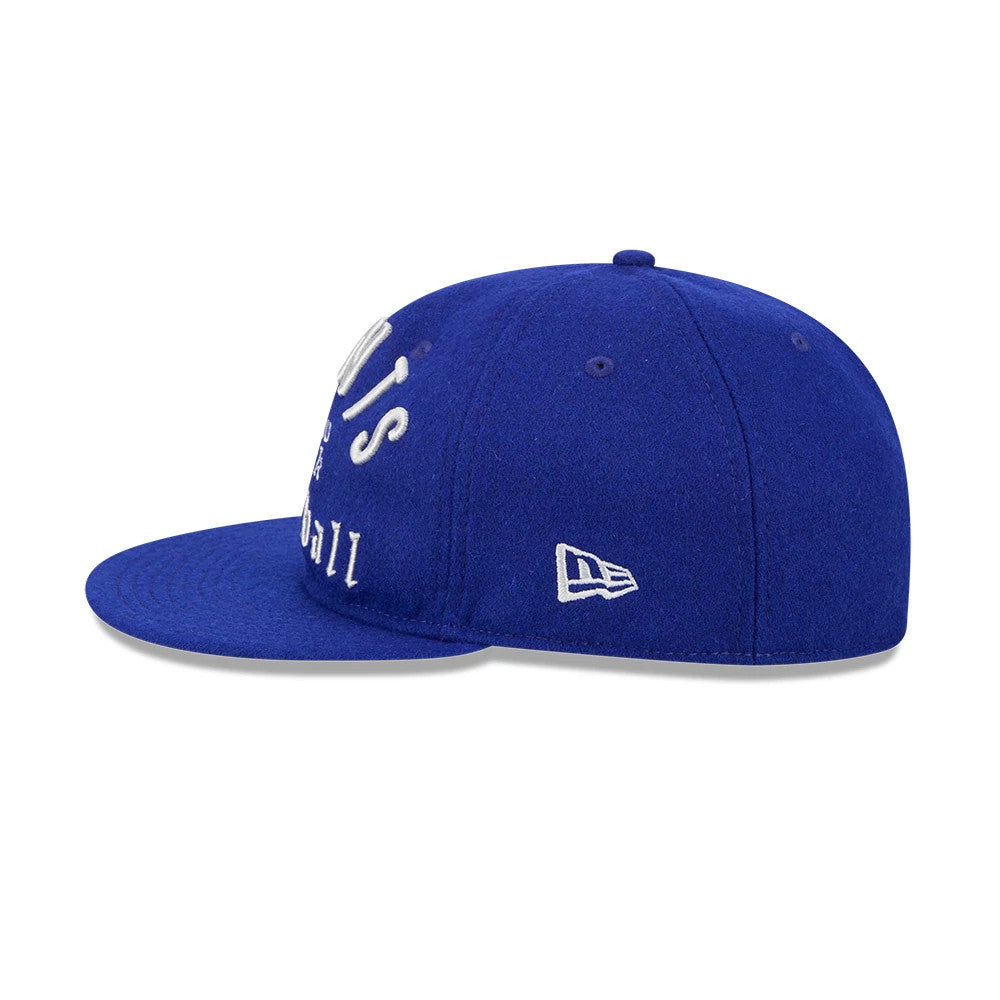Giants NFL Historic Arch Dark Blue Retro Crown New Era 59FIFTY Fitted Cap, side view showing the white New Era flag logo on the left side, highlighting the low-profile structure of the dark blue crown with embroidered details on the front panel.