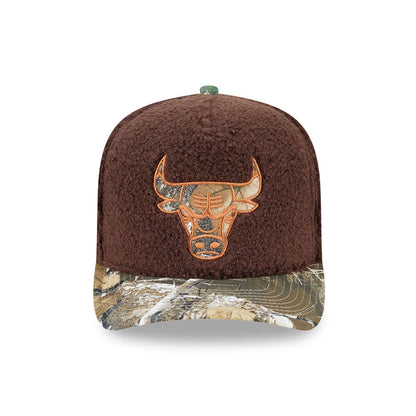Chicago Bulls NBA Hardwood Classic Brown New Era 59FIFTY A-Frame Fitted Cap, front view showing an orange embroidered bull logo on a textured brown crown, with a camo patterned flat visor and a matching green top button.