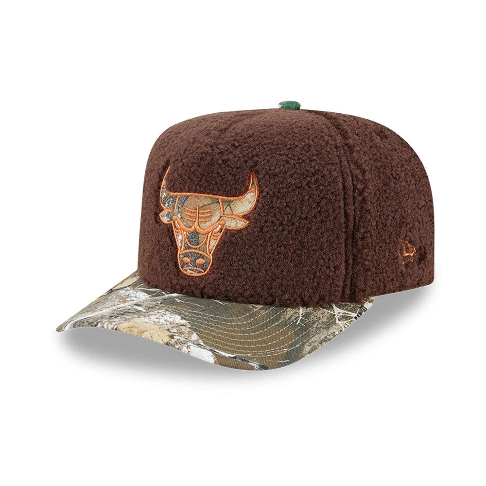 Chicago Bulls NBA Hardwood Classic Brown New Era 59FIFTY A-Frame Fitted Cap, three-quarter view showing the orange embroidered Bulls logo on brown fleece front panels, the camouflage pattern flat visor, and the New Era flag logo on the left side.