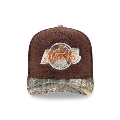 LA Lakers NBA Hardwood Classic Brown New Era 59FIFTY A-Frame Fitted Cap, front view showing the orange and white Lakers logo embroidered on the brown fleece front panel, with a camouflage-patterned flat visor and a matching top button.