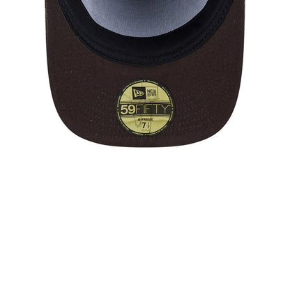 LA Lakers NBA Hardwood Classic Brown New Era 59FIFTY A-Frame Fitted Cap, inside view showing the light grey undervisor, black sweatband, and the gold 59FIFTY size sticker centred on the brown flat visor.