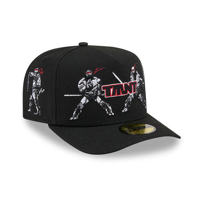 Teenage Mutant Ninja Heroes Black New Era 59FIFTY A-Frame Fitted Cap, three-quarter view showing raised TMNT lettering and embroidered Ninja Turtles in white with red masks on the front panels, a black visor and a gold 59FIFTY size sticker.