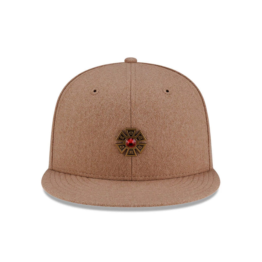 Pictured is this New Era X J Balvin & Ryan Castro Omerta New Era 59FIFTY Fitted cap in beige. 2