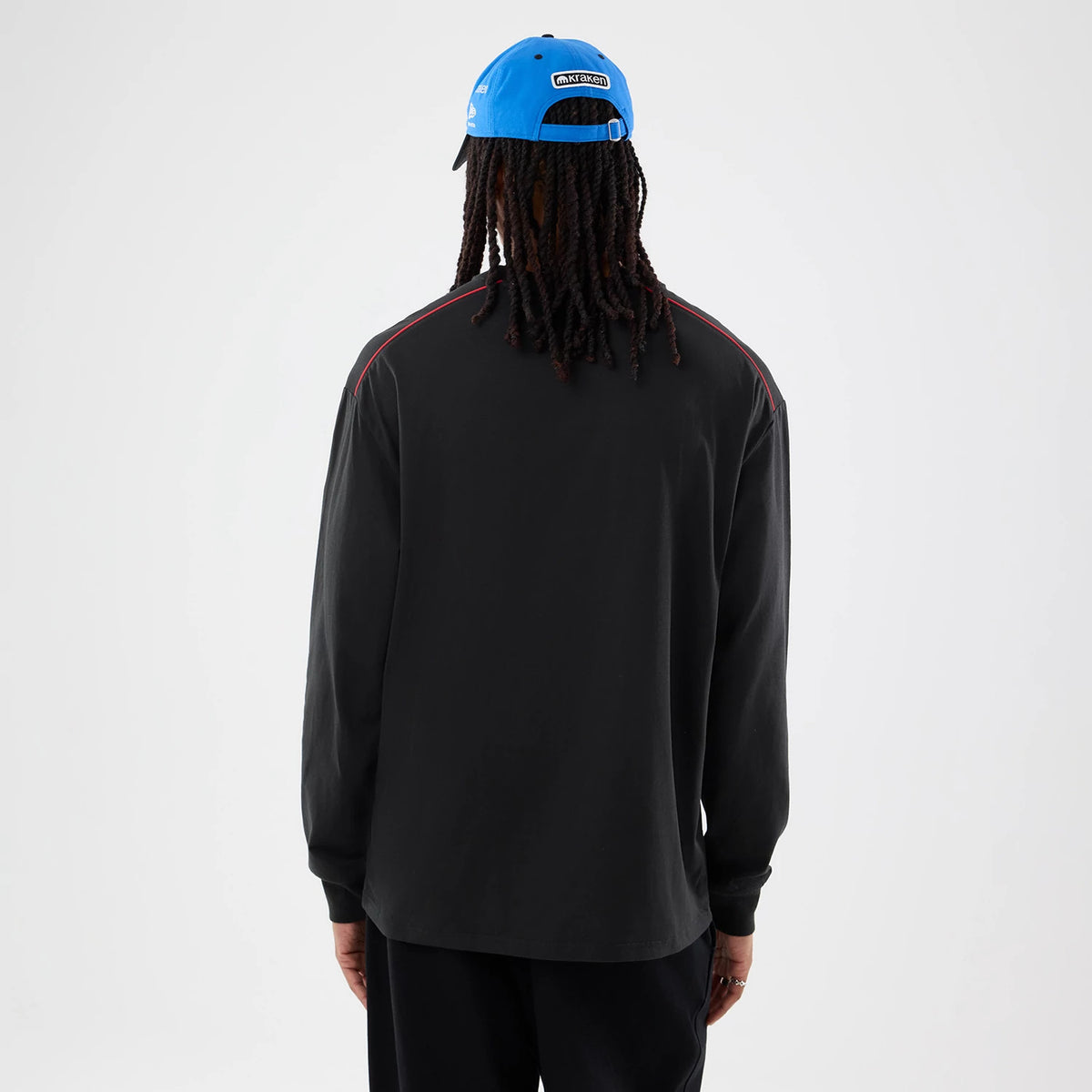 The model is wearing this Williams Vegas Race Special Long Sleeve T-Shirt in black. 2
