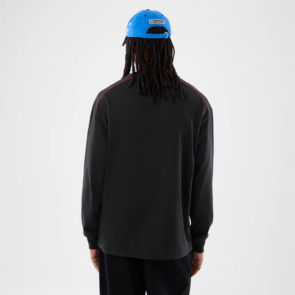 The model is wearing this Williams Vegas Race Special Long Sleeve T-Shirt in black. 2