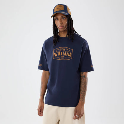 The model is wearing this Williams Austin Race Special Graphic T-Shirt in navy. 1