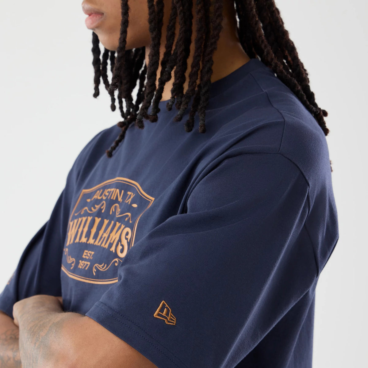 The model is wearing this Williams Austin Race Special Graphic T-Shirt in navy. 3