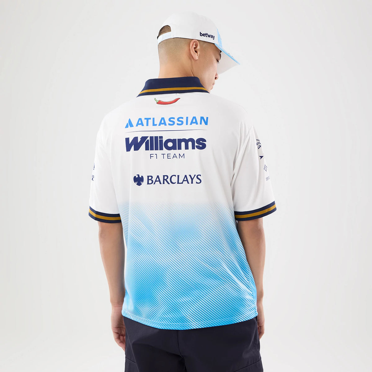 The model is wearing this Williams Spain Race Special T-Shirt in white. 2