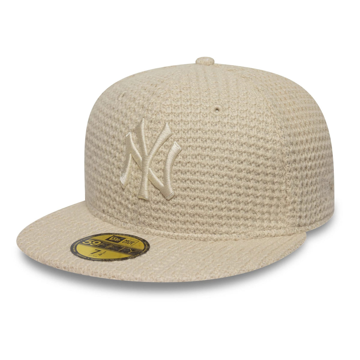 Pictured is this MLB Knitted New York Yankees 59FIFTY Fitted cap in light beige. 1