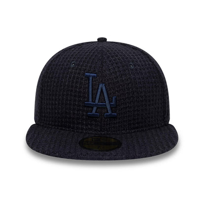 Pictured is this MLB Knitted LA Dodgers 59FIFTY Fitted cap in navy. 2