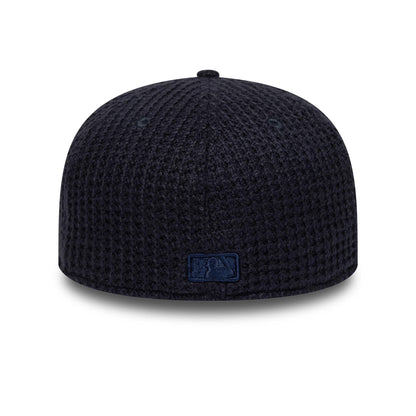 Pictured is this MLB Knitted LA Dodgers 59FIFTY Fitted cap in navy. 4
