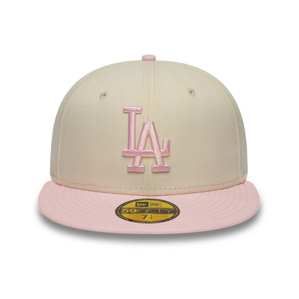 Pictured is this MLB League Essential LA Dodgers 59FIFTY Fitted cap in cream & pink. 2