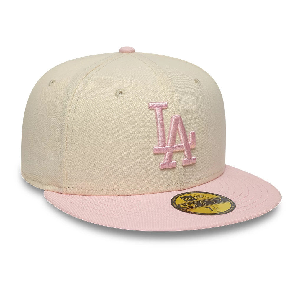 Pictured is this MLB League Essential LA Dodgers 59FIFTY Fitted cap in cream & pink. 3