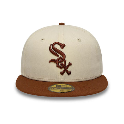 Pictured is this MLB League Essential Chicago White Sox 59FIFTY Fitted cap in cream & brown. 2