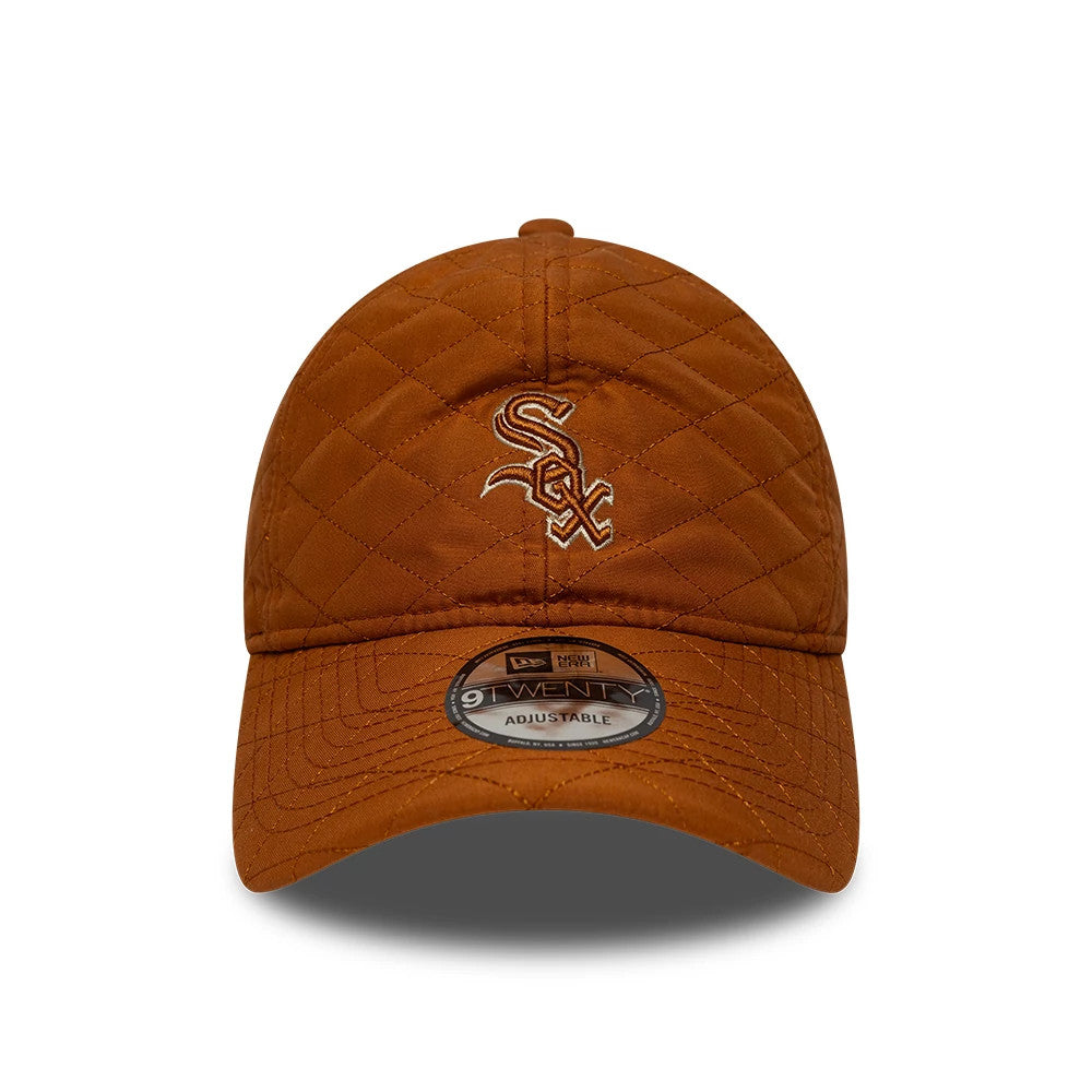 Chicago White Sox MLB Padded Outline Brown New Era 9TWENTY Adjustable Cap, front view showing the white embroidered team logo on a quilted brown crown, with a matching curved visor and a 9TWENTY size sticker at the centre.
