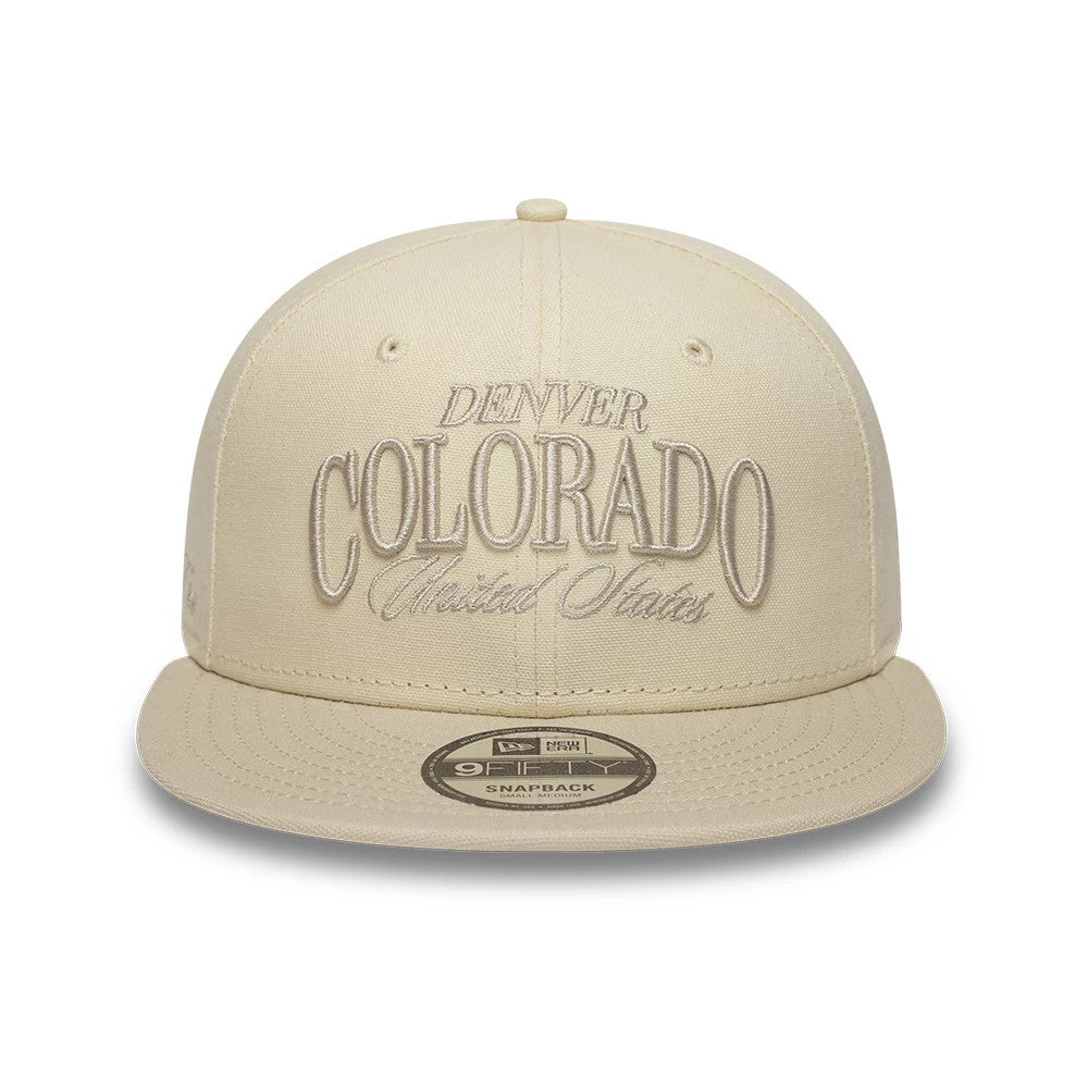 Pictured is this New Era Fabric Script 9FIFTY Snapback cap in Cream & black. 2