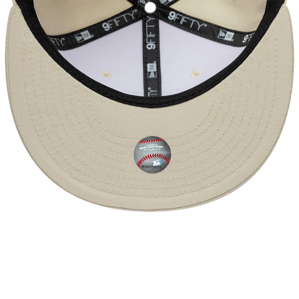 Pictured is this New Era Fabric Script 9FIFTY Snapback cap in Cream & black. 7