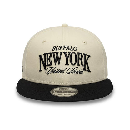 Pictured is this New Era Fabric Wordmark New Era 9FIFTY Snapback cap in cream & black. 2