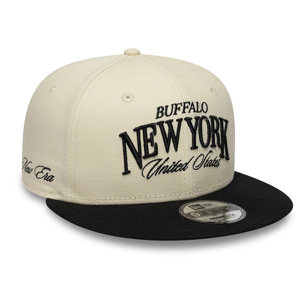 Pictured is this New Era Fabric Wordmark New Era 9FIFTY Snapback cap in cream & black. 3